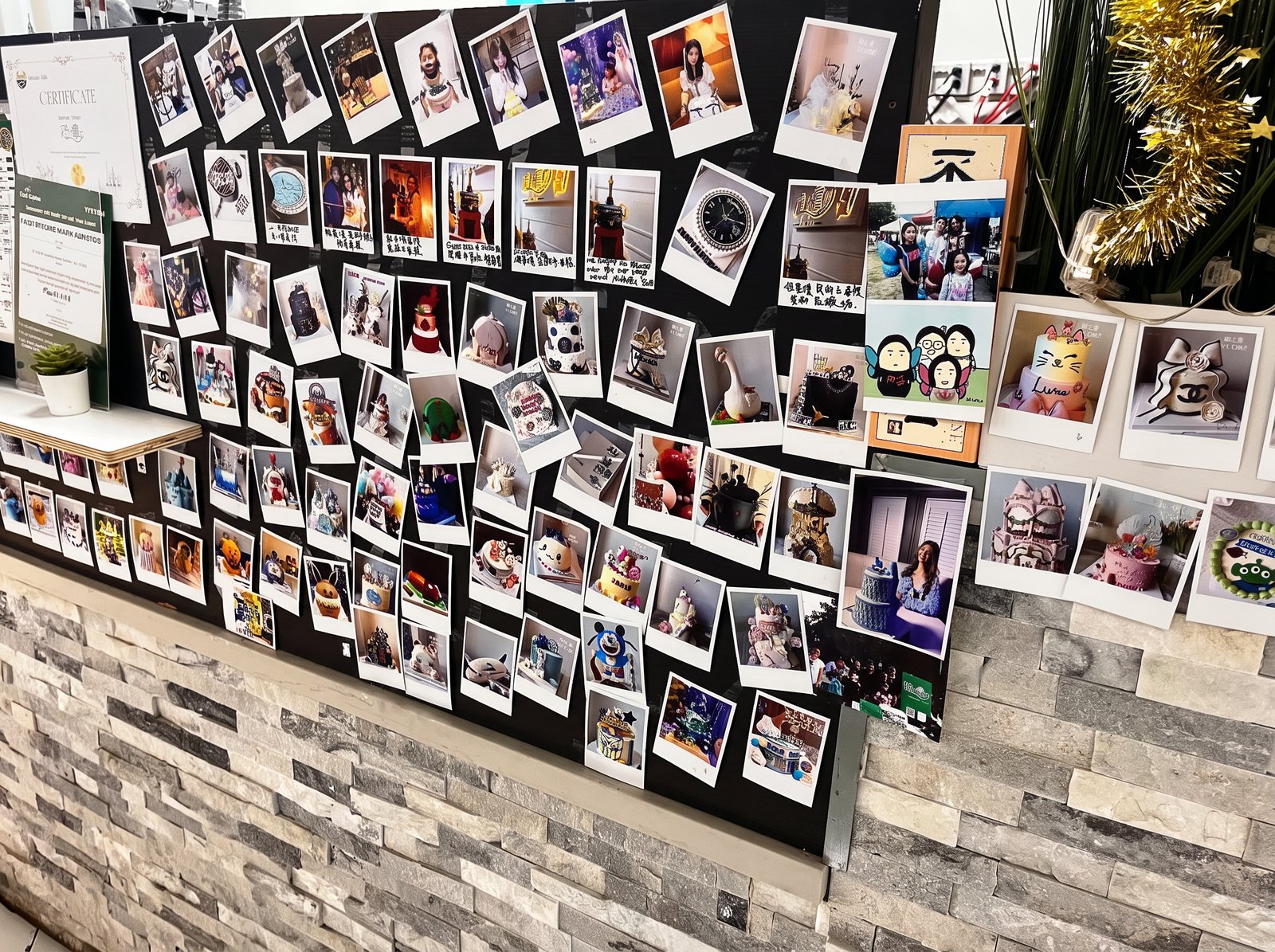 Wall of photos showing hundreds of X-Cake custom cake designs